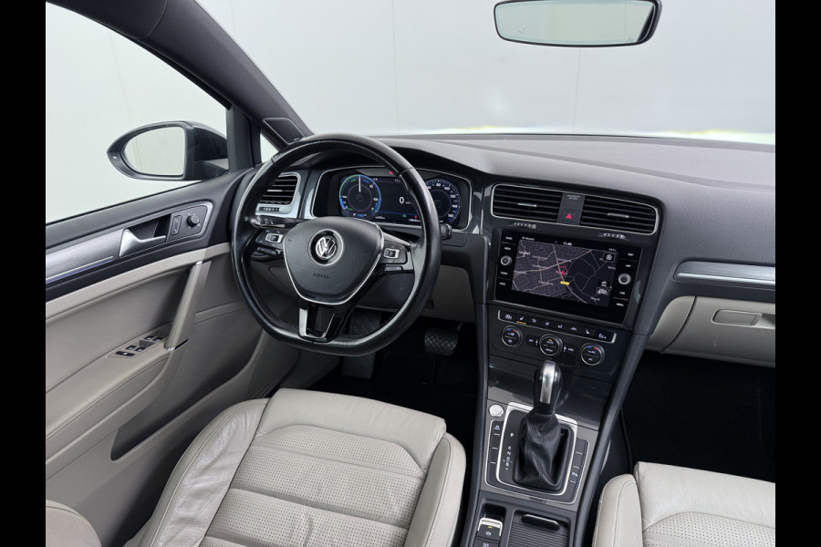 Volkswagen e-Golf Leer Warmtepomp LED+ Apple Carplay Android Navi Adaptieve-Cr. Digit.Dashb. PDC-v+a DAB 17" Ecc Led Premium Audio High-End- Dynaudio Zwarte-Hemel Lmv Privacy Glas Spiegel Pakket Virtual Cockpit Leder Pakket Stoelverwarming Origineel Nederlandse Auto Dealeronderhouden € 48.000 Nieuw!