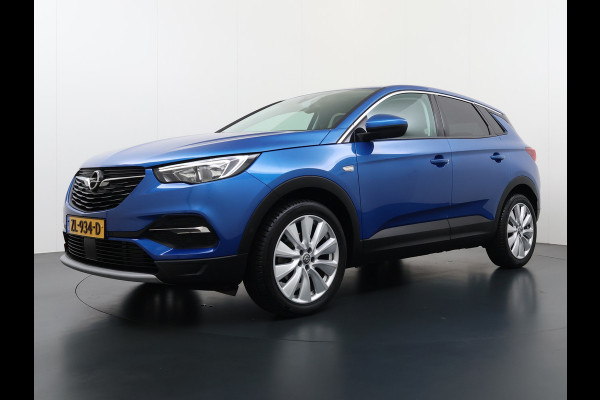Opel Grandland X T131pk Navi Trekhaak Executive Dual-Ecc Apple Carplay Android PDC-a+v Park-Assist Distr.-Riem bij 61.000km vervangen Chroompakket Priv.Glass Volledig dealer onderhouden, laatste beurt bij 61.000km 1400kg trekvermogen.  EURO6