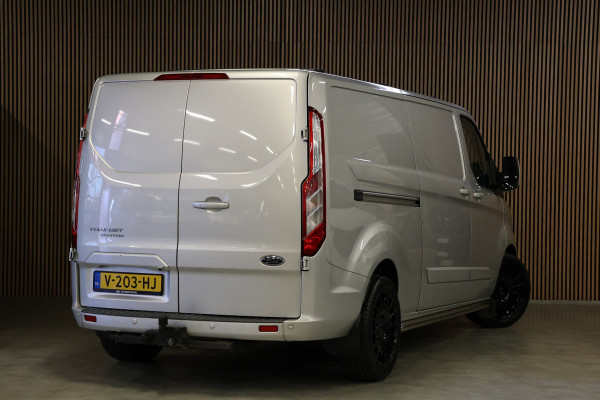 Ford Transit Custom 290 2.0 TDCI 170 PK L2H1 Limited | Standkachel | Navigatie | Stoelverwarming | Camera | Cruise control | Trekhaak | NAP Logisch | Dakdragers | Airco | 3-Zitter