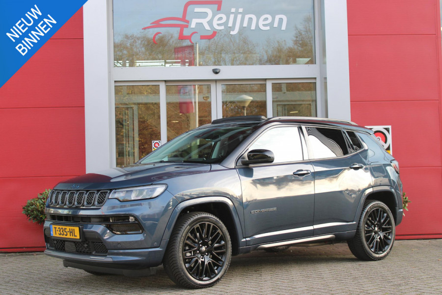 Jeep Compass 4xe 240PK Plug-in Hybrid ELECTRIC S | PANORAMSICH SCHUIF/KANTEL DAK | STOEL/STUUR VERWARMING | ALL SEASON BANDEN | 19" LICHTMETALEN VELGEN "GLOSSY BLACK" | ELEKTRISCH BEDIENBARE BESTUURDERSSTOEL | LEDEREN BEKLEDING | ADAPTIVE CRUISE CONTROL | NAVIGATIE | DRAADLOZE APPLE CARPLAY/ANDROID AUTO | DRAADLOZE TELEFOONLADER | DAB+ RADIO | ELEKTRISCH BEDIENBARE ACHTERKLEP | ACHTERUITRIJ CAMERA | KEYLESS ENTRY/START |