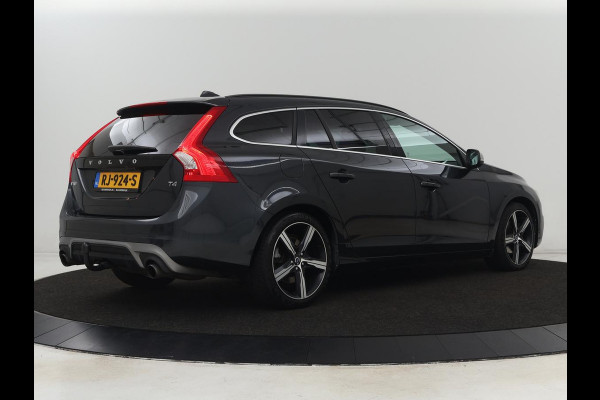 Volvo V60 2.0 T4 R Design | Stoel & stuurverwarming | Adaptive cruise | Trekhaak | Bi-Xenon | Camera | Achterbankverwarming | Keyless | Navigatie | Parkeerhulp | Bluetooth | Climate control