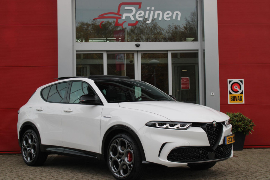Alfa Romeo Tonale 1.5T 160PK Hybrid VELOCE | PANORAMISCH SCHUIF/KANTEL DAK | PREMIUM PACK: LEDEREN BEKLEDING/GEVENTILEERDE VOORSTOELEN/4-VOUDIG ELEKTRISCH VERSTELBARE LENDESTEUN VOORSTOELEN/HOOGGLANS ZWARTE RAAMOMLIJSTING/AMBIENT LIGHTING | TECHNOLOGY PACK: PARKEERWAARSCHUWING VOOR EN ACHTER/360° CAMERA/AUTOMATISCH INPARKEREN/ AUTONOMOUS DRIVING LEVEL 2: ADAPTIVE CRUISE CONTROL/LANE CENTERING ASSIST/TRAFFIC JAM ASSIST DODEHOEK DETECTIE AUTOMATISCH DIMMENDE BUITENSPIEGELS ELEKTRISCH BEDIENBARE ACHTERKLEP | WINTERPACK: STOELVERWARMING VOOR/STUURVERWARMING/VERWARMBARE RUITENSPROEIERS | HAR