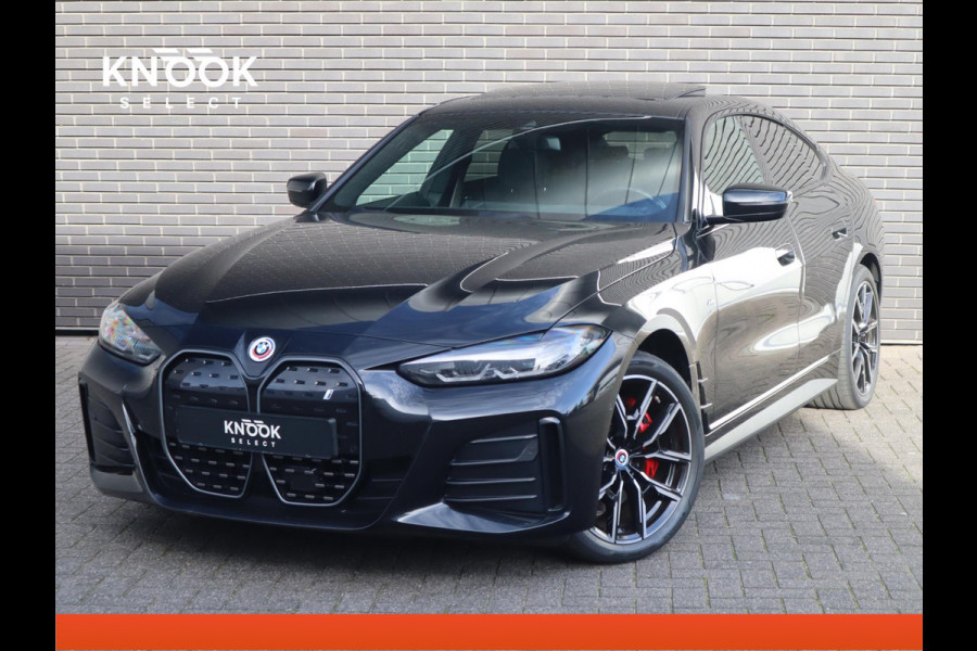 BMW i4 eDrive40 High Executive M Sport Pakket Automaat / Live Cockpit Professional / Schuif-/kanteldak / Driving Assistant / Leder / Hifi / M Sportremsysteem / Stoelverwarming / Extra Getint Glas /  M Achterspoiler / Shadow Line