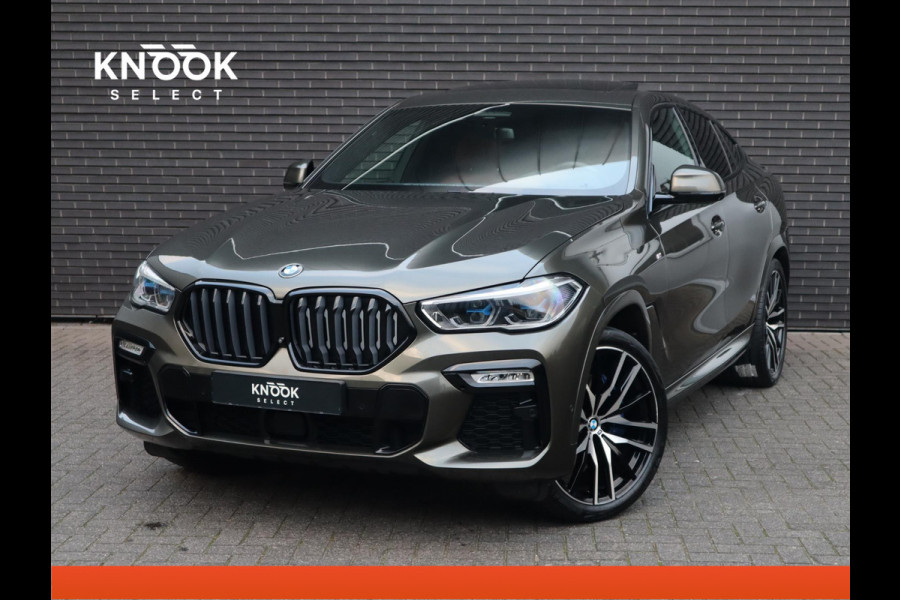 BMW X6 xDrive40i High Executive M Sport Pakket Automaat / Live Cockpit Professional / Panoramadak / Trekhaak / Bowers & Wilkins / Integrale Actieve Besturing / M Sportremsysteem / Driving Assistant Professional / Laserlicht / Iconic Glow / Comfortstoelen met massage  / 22 Inch/