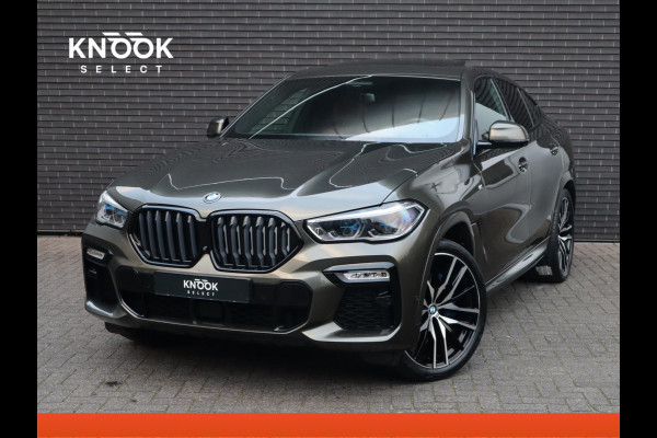 BMW X6 xDrive40i High Executive M Sport Pakket Automaat / Live Cockpit Professional / Panoramadak / Trekhaak / Bowers & Wilkins / Integrale Actieve Besturing / M Sportremsysteem / Driving Assistant Professional / Laserlicht / Iconic Glow / Comfortstoelen met massage  / 22 Inch/
