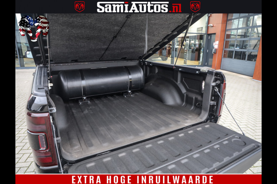 Dodge Ram 1500 BLACK OPS LONGHORN 5.7 V8 HEMI | 8820KM! | BOM VOL | HUD | LUCHTVERING | PANO | 200L LPG | ADAPTIVE CRUISE | DIGI VIRTUAL CLUSTER | CARPLAY | 3500KG | HEADUP | CREW CAB DUBBELE CABINE | 5 PERSOONS | ZWART MET BRUIN LEDER | Z.G.A.N