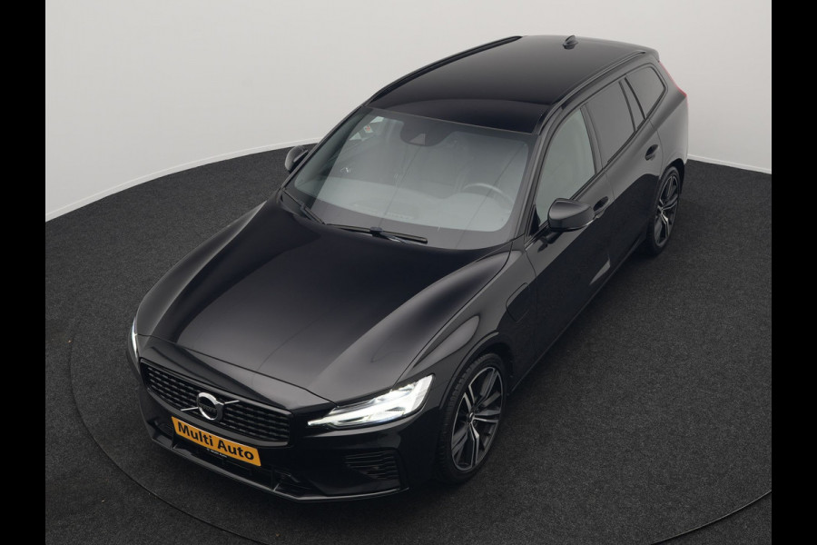 Volvo V60 T6 Recharge AWD R-Design Plug In Hybrid 340pk Dealer O.H. PHEV | Trekhaak Af Fabriek | Adaptive Cruise | Camera | Harman & Kardon | Lederen Sportstoelen Memory & Verwarmd | Apple Carplay | Navigatie | Stuur Verwarmd | Blis | Keyless | DAB |