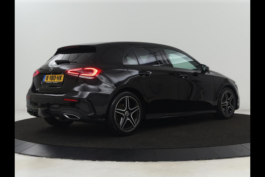 Mercedes-Benz A-Klasse 180 AMG | Adaptive cruise | Trekhaak | Stoelverwarming | Camera | Leder/Alcantara | Sfeerverlichting | Navigatie | Park Assist | Full LED | Climate control | Bluetooth