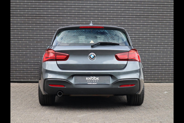 BMW 1-serie 118i High Executive M Sport Pakket Automaat 5 deurs / Navigatie Professional / Leder / 18 Inch / Shadow Line / Stoelverwarming / LED / Parkeersensoren voor+achter / Cruise Control / DAB / Lichtpakket