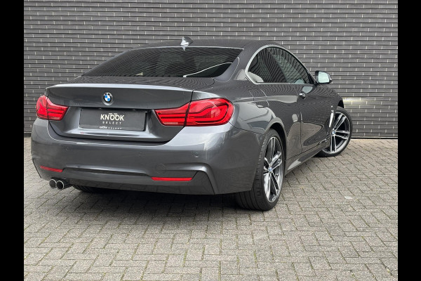 BMW 4 Serie Coupé 420i High Executive M Sport Pakket Automaat / Navigatie Professional / Leder / 19 Inch / Stoelverwarming / Multifunctioneel Instrumentendisplay / Shadow Line / Climate Control / Parkeersensoren voor+achter / Neerklapbare Achterbank