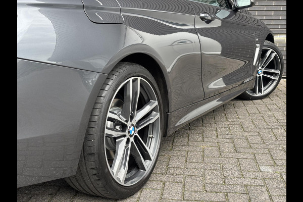 BMW 4 Serie Coupé 420i High Executive M Sport Pakket Automaat / Navigatie Professional / Leder / 19 Inch / Stoelverwarming / Multifunctioneel Instrumentendisplay / Shadow Line / Climate Control / Parkeersensoren voor+achter / Neerklapbare Achterbank