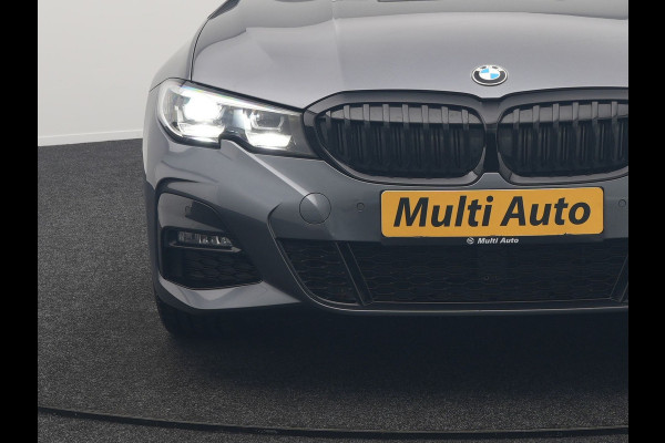 BMW 3 Serie Touring 330e xDrive M Sport Plug In Hybrid 293pk Dealer O.H. PHEV | Trekhaak Af Fabriek | Panodak | Harman & Kardon | Adaptief Onderstel | Camera | Alcantara Sportstoelen Verwarmd | Sfeerverlichting | Apple Carplay | Stuur Verwarmd | Navigatie | DAB |
