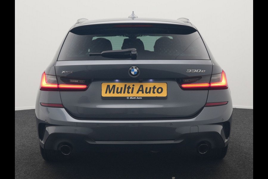 BMW 3 Serie Touring 330e xDrive M Sport Plug In Hybrid 293pk Dealer O.H. PHEV | Trekhaak Af Fabriek | Panodak | Harman & Kardon | Adaptief Onderstel | Camera | Alcantara Sportstoelen Verwarmd | Sfeerverlichting | Apple Carplay | Stuur Verwarmd | Navigatie | DAB |