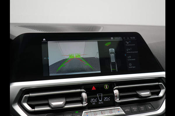 BMW 3 Serie Touring 330e xDrive M Sport Plug In Hybrid 293pk Dealer O.H. PHEV | Trekhaak Af Fabriek | Panodak | Harman & Kardon | Adaptief Onderstel | Camera | Alcantara Sportstoelen Verwarmd | Sfeerverlichting | Apple Carplay | Stuur Verwarmd | Navigatie | DAB |