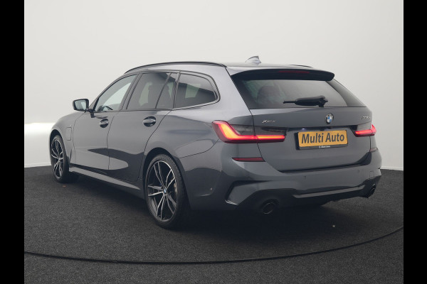 BMW 3 Serie Touring 330e xDrive M Sport Plug In Hybrid 293pk Dealer O.H. PHEV | Trekhaak Af Fabriek | Panodak | Harman & Kardon | Adaptief Onderstel | Camera | Alcantara Sportstoelen Verwarmd | Sfeerverlichting | Apple Carplay | Stuur Verwarmd | Navigatie | DAB |