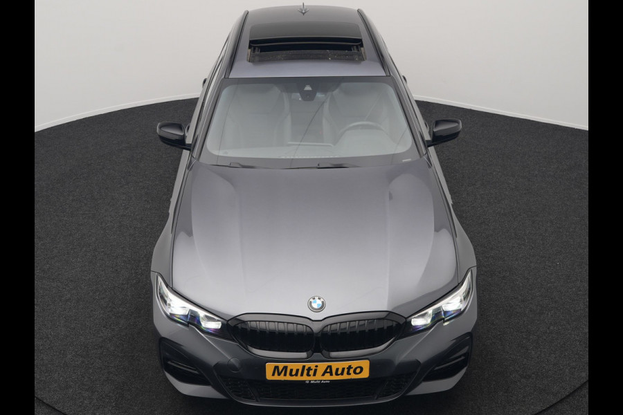 BMW 3 Serie Touring 330e xDrive M Sport Plug In Hybrid 293pk Dealer O.H. PHEV | Trekhaak Af Fabriek | Panodak | Harman & Kardon | Adaptief Onderstel | Camera | Alcantara Sportstoelen Verwarmd | Sfeerverlichting | Apple Carplay | Stuur Verwarmd | Navigatie | DAB |