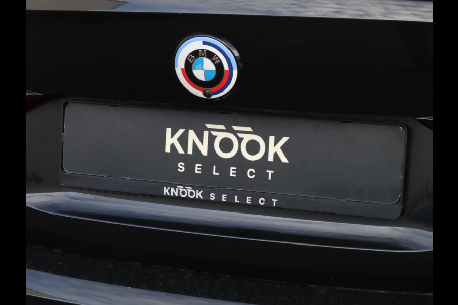 BMW i4 eDrive40 High Executive M Sport Pakket Automaat / Live Cockpit Professional / Schuif-/kanteldak / Driving Assistant / Leder / Hifi / M Sportremsysteem / Stoelverwarming / Extra Getint Glas /  M Achterspoiler / Shadow Line