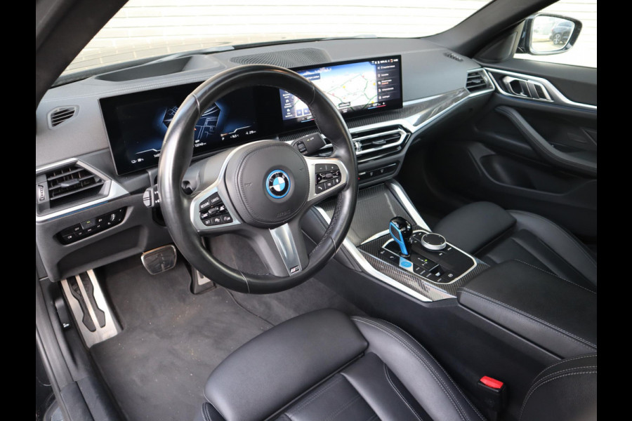 BMW i4 eDrive40 High Executive M Sport Pakket Automaat / Live Cockpit Professional / Schuif-/kanteldak / Driving Assistant / Leder / Hifi / M Sportremsysteem / Stoelverwarming / Extra Getint Glas /  M Achterspoiler / Shadow Line