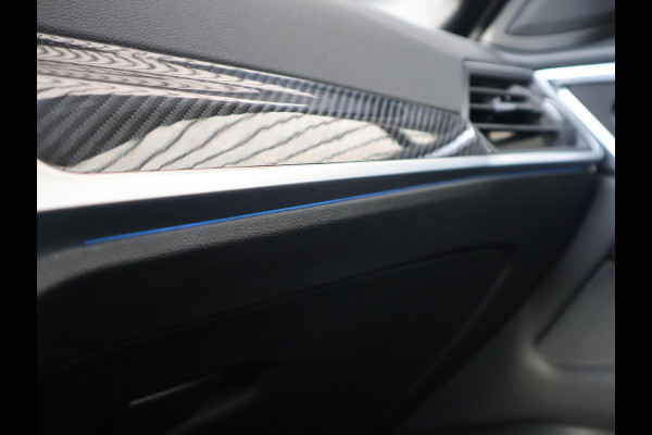 BMW i4 eDrive40 High Executive M Sport Pakket Automaat / Live Cockpit Professional / Schuif-/kanteldak / Driving Assistant / Leder / Hifi / M Sportremsysteem / Stoelverwarming / Extra Getint Glas /  M Achterspoiler / Shadow Line