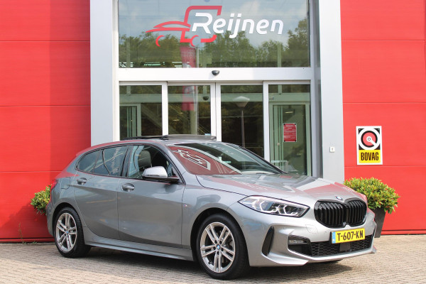 BMW 1-serie 118i 136PK INTRODUCTION EDITION M-SPORT | PANORAMISCH SCHUIF/KANTEL DAK | SHADOW LINE PAKKET | SFEER VERLICHTING | LEDEREN BEKLEDING "DAKOTA GEPERFOREERD" | ACHTERUITRIJ CAMERA | PARKEERSENSOREN VOOR EN ACHTER | ALARM | STOEL VERWARMING | DRAADLOZE APPLE CARPLAY/ANDROID AUTO | LICHTMETALEN VELGEN 17" | LANE ASSIST | DAB+ RADIO | SPORT STOELEN | WARMTE WEREND GLAS  | BMW LIVE COCKPIT PROFESSIONAL |