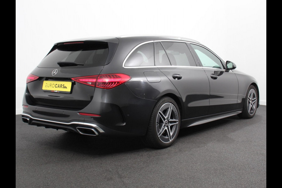 Mercedes-Benz C-Klasse Estate 200 AMG Line | Climate control | Achteruitrijcamera | Wegklapbare trekhaak | Navigatie | Dodehoek assistent | LED | Sfeerverlichting | Adaptieve cruise control | Verwarmde voorstoelen | Elektrische kofferbak