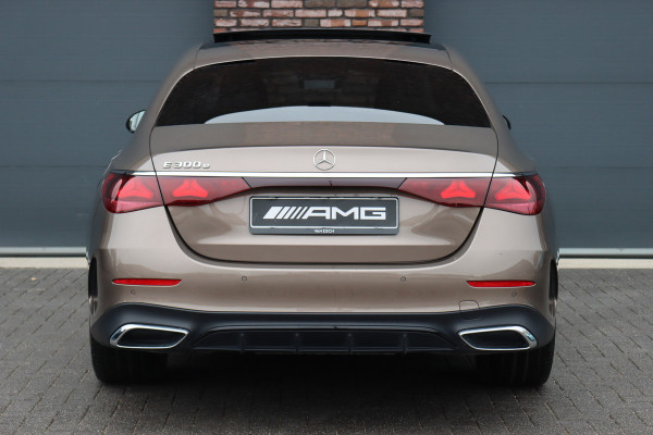 Mercedes-Benz E-Klasse 300 e AMG Line | Hyperscreen | Airmatic | Achterasbesturing | Distronic+ | Stoelventilatie | Memory | Burmester | HUD | Digital Light | Surround Camera | Verwarmd Stuurwiel |