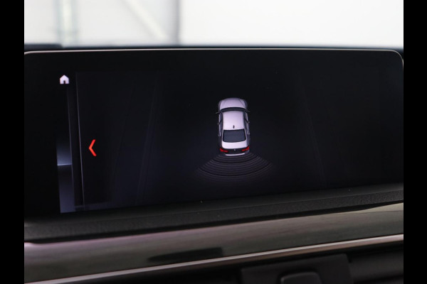 BMW 3 Serie 318i Luxury Edition | Leder | Stoelverwarming | Navigatie | Trekhaak | Full LED | Climate control | PDC | Cruise control