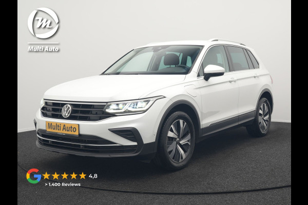 Volkswagen Tiguan 1.4 TSI eHybrid Elegance Plug In Hybrid 245pk Dealer O.H. PHEV | Trekhaak Af Fabriek | Adaptive Cruise | IQ Light | Camera | Stoelen & Stuur Verwarmd | Apple Carplay | Blis | Navigatie | DAB |
