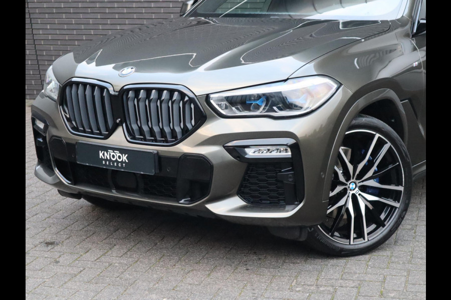 BMW X6 xDrive40i High Executive M Sport Pakket Automaat / Live Cockpit Professional / Panoramadak / Trekhaak / Bowers & Wilkins / Integrale Actieve Besturing / M Sportremsysteem / Driving Assistant Professional / Laserlicht / Iconic Glow / Comfortstoelen met massage  / 22 Inch/