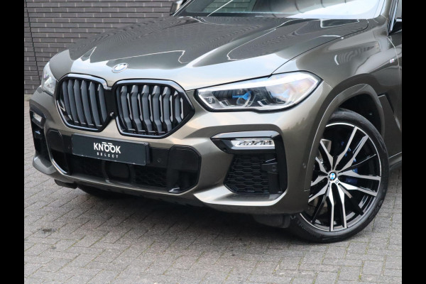 BMW X6 xDrive40i High Executive M Sport Pakket Automaat / Live Cockpit Professional / Panoramadak / Trekhaak / Bowers & Wilkins / Integrale Actieve Besturing / M Sportremsysteem / Driving Assistant Professional / Laserlicht / Iconic Glow / Comfortstoelen met massage  / 22 Inch/