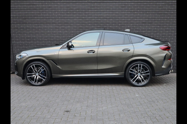 BMW X6 xDrive40i High Executive M Sport Pakket Automaat / Live Cockpit Professional / Panoramadak / Trekhaak / Bowers & Wilkins / Integrale Actieve Besturing / M Sportremsysteem / Driving Assistant Professional / Laserlicht / Iconic Glow / Comfortstoelen met massage  / 22 Inch/