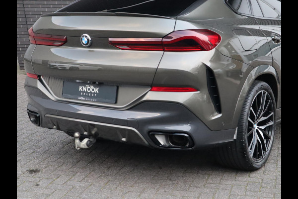 BMW X6 xDrive40i High Executive M Sport Pakket Automaat / Live Cockpit Professional / Panoramadak / Trekhaak / Bowers & Wilkins / Integrale Actieve Besturing / M Sportremsysteem / Driving Assistant Professional / Laserlicht / Iconic Glow / Comfortstoelen met massage  / 22 Inch/