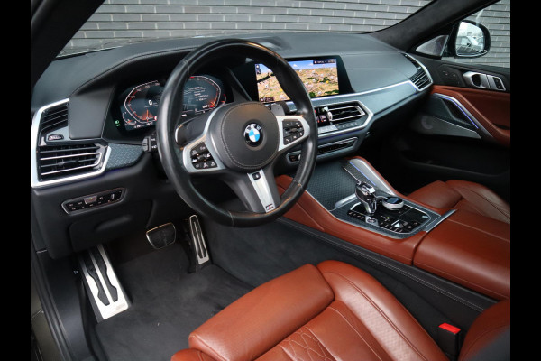 BMW X6 xDrive40i High Executive M Sport Pakket Automaat / Live Cockpit Professional / Panoramadak / Trekhaak / Bowers & Wilkins / Integrale Actieve Besturing / M Sportremsysteem / Driving Assistant Professional / Laserlicht / Iconic Glow / Comfortstoelen met massage  / 22 Inch/
