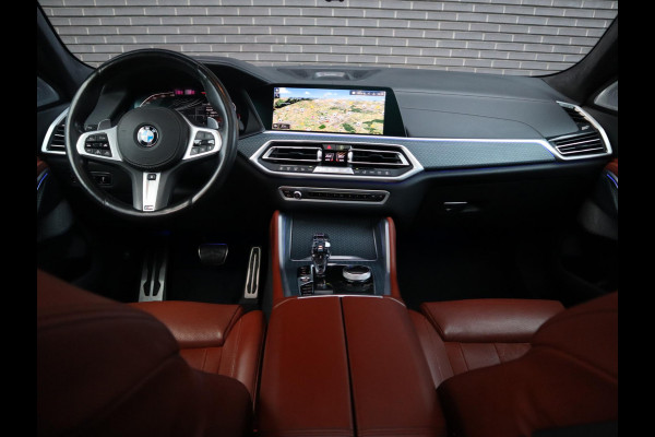 BMW X6 xDrive40i High Executive M Sport Pakket Automaat / Live Cockpit Professional / Panoramadak / Trekhaak / Bowers & Wilkins / Integrale Actieve Besturing / M Sportremsysteem / Driving Assistant Professional / Laserlicht / Iconic Glow / Comfortstoelen met massage  / 22 Inch/
