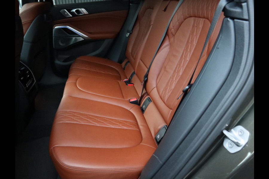BMW X6 xDrive40i High Executive M Sport Pakket Automaat / Live Cockpit Professional / Panoramadak / Trekhaak / Bowers & Wilkins / Integrale Actieve Besturing / M Sportremsysteem / Driving Assistant Professional / Laserlicht / Iconic Glow / Comfortstoelen met massage  / 22 Inch/