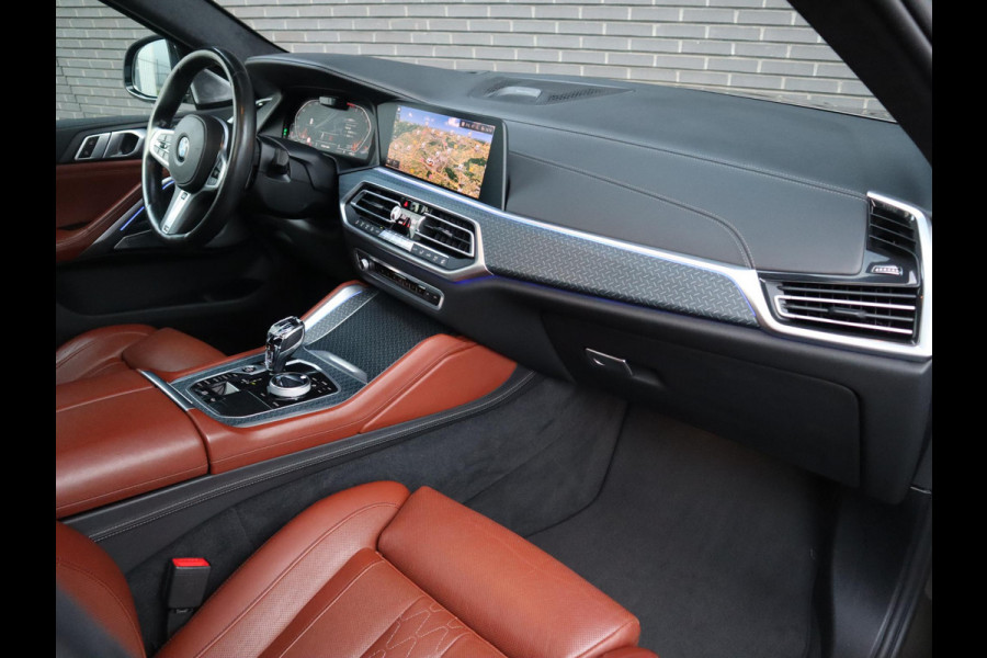 BMW X6 xDrive40i High Executive M Sport Pakket Automaat / Live Cockpit Professional / Panoramadak / Trekhaak / Bowers & Wilkins / Integrale Actieve Besturing / M Sportremsysteem / Driving Assistant Professional / Laserlicht / Iconic Glow / Comfortstoelen met massage  / 22 Inch/