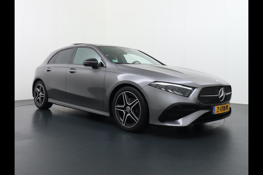 Mercedes-Benz A-Klasse 200 AMG Line FACELIFT | 163PK | Night-pakket | Panoramadak | Ambienteverlichting | Dodehoek | Mountaingrau | Rijklaar + 12 mnd BOVAG garantie