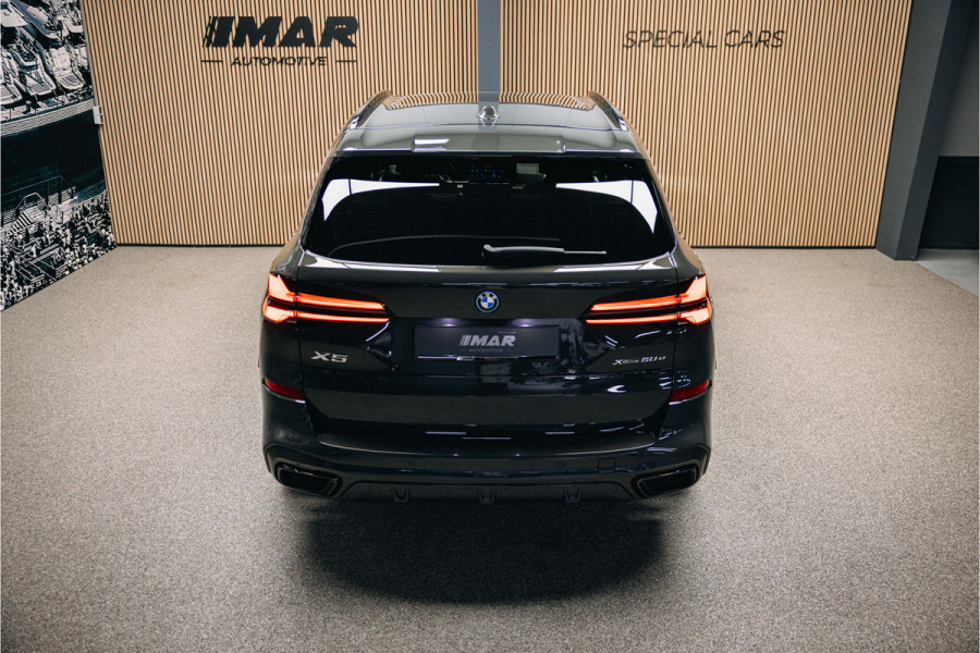 BMW X5 xDrive50e | Luxe stoelen | Luchtvering | Dravit Grau | Trekhaak | Stuur en stoelverwarming | Harman/Kardon |