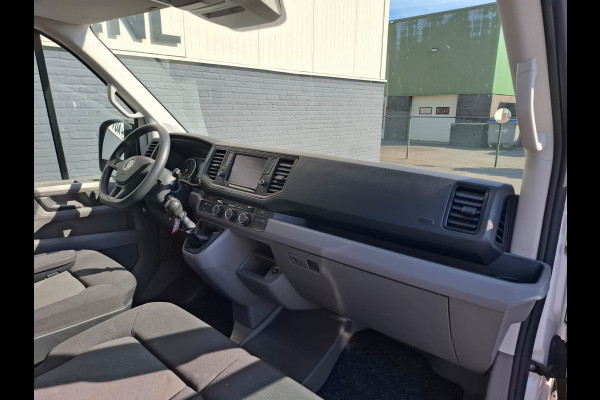 Volkswagen Crafter 35 2.0TDI L3H3 3-Persoons Navi Airco Cruise Control Verwarmbare Voorruit Regensensor Pdc Schuifdeur Betonplex vloer Wandbetimmering Highline Euro 6 Diverse beschadigingen rondom