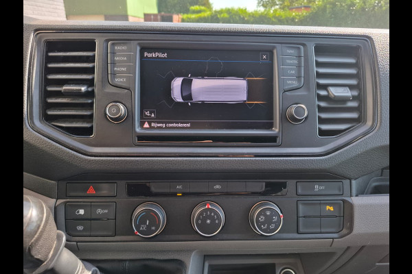 Volkswagen Crafter 35 2.0TDI L3H3 3-Persoons Navi Airco Cruise Control Verwarmbare Voorruit Regensensor Pdc Schuifdeur Betonplex vloer Wandbetimmering Highline Euro 6 Diverse beschadigingen rondom