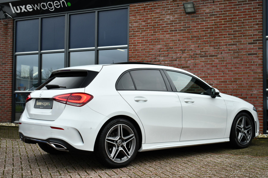 Mercedes-Benz A-Klasse 180 AMG Pano Trekhaak Camera Night Metallic-wit