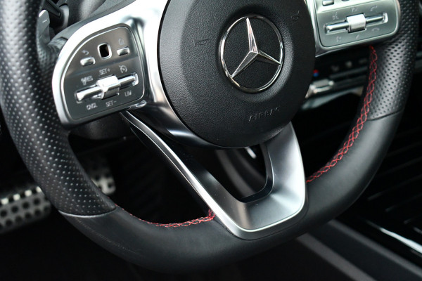 Mercedes-Benz A-Klasse 180 AMG Pano Trekhaak Camera Night Metallic-wit