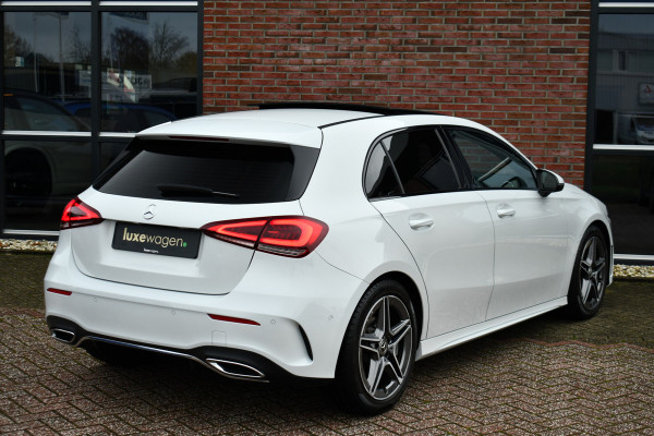 Mercedes-Benz A-Klasse 180 AMG Pano Trekhaak Camera Night Metallic-wit