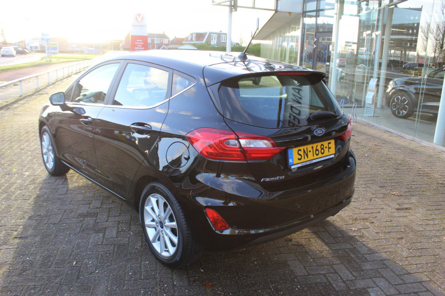 Ford Fiesta 1.0-100pk EcoBoost Titanium 5deurs Mooie en zuinige Ford Fiesta in de luxe Titanium uitvoering. Climate control , Cruise control , Navigatie , Bluetooth