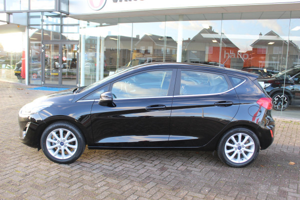 Ford Fiesta 1.0-100pk EcoBoost Titanium 5deurs Mooie en zuinige Ford Fiesta in de luxe Titanium uitvoering. Climate control , Cruise control , Navigatie , Bluetooth