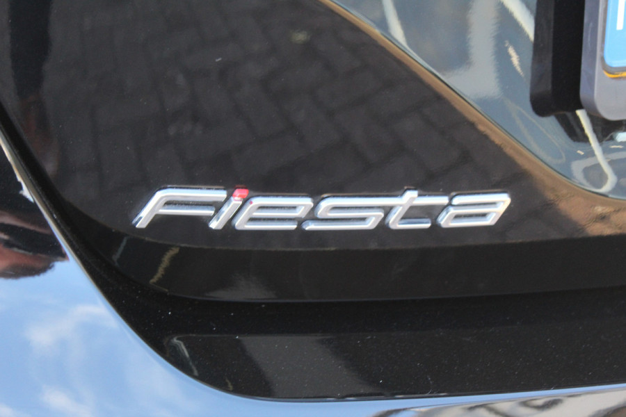 Ford Fiesta 1.0-100pk EcoBoost Titanium 5deurs Mooie en zuinige Ford Fiesta in de luxe Titanium uitvoering. Climate control , Cruise control , Navigatie , Bluetooth