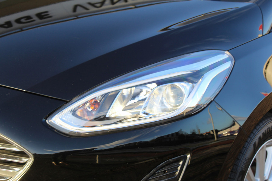 Ford Fiesta 1.0-100pk EcoBoost Titanium 5deurs Mooie en zuinige Ford Fiesta in de luxe Titanium uitvoering. Climate control , Cruise control , Navigatie , Bluetooth