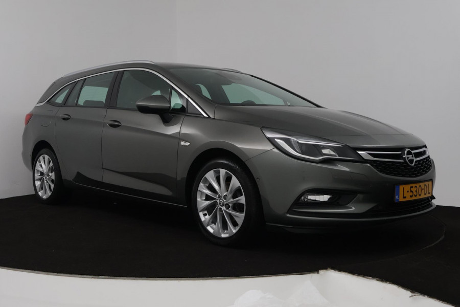 Opel Astra Sports Tourer 1.4 Business Executive (ACHTERUITRIJCAMERA, PARKEERSENSOREN, CRUISE CONTROL, NAVIGATIE)