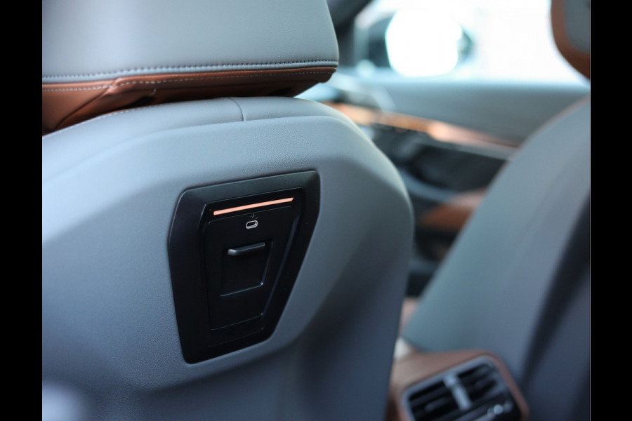 BMW 5 Serie Touring 550e xDrive | Oxford Green - Pano - Trekhaak - B&W