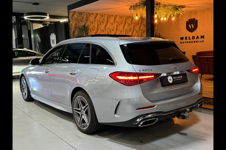 Mercedes-Benz C-Klasse Estate 300 e AMG Line Garantie Trekhaak Massage Pano Ambient 360 Blindspot Elek Achterklep StuurVW Rijklaar
